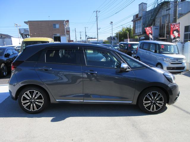 フィット e:HEVリュクス 純正9型ナビ フルセグTV 全周囲カメラ アダプティブクルーズコントロール ドラレコ ETC ハーフレザーシート シートヒーター ステアリングヒーター ブラインドスポットモニター LEDヘッドライト(13枚目)