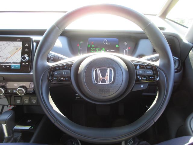 フィット e:HEVリュクス 純正9型ナビ フルセグTV 全周囲カメラ アダプティブクルーズコントロール ドラレコ ETC ハーフレザーシート シートヒーター ステアリングヒーター ブラインドスポットモニター LEDヘッドライト(20枚目)