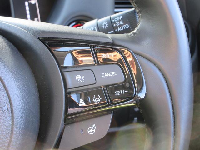 フィット e:HEVリュクス 純正9型ナビ フルセグTV 全周囲カメラ アダプティブクルーズコントロール ドラレコ ETC ハーフレザーシート シートヒーター ステアリングヒーター ブラインドスポットモニター LEDヘッドライト(24枚目)