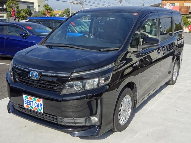 ヴォクシー ハイブリッドＶ　純正ナビ　フルセグＴＶ　両側パワースライドドア　バックカメラ　ＥＴＣ　Ｂｌｕｅｔｏｏｔｈ　ＤＩＳＣ　クルーズコントロール　レーンキープアシスト　シートヒーター　ダブルエアコン　オートライト（6枚目）