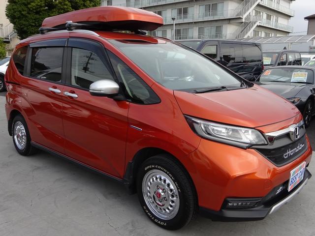 フリード＋ハイブリッド ハイブリッド・クロスターホンダセンシング　４ＷＤ　ホンダセンシング　ルーフボックス　純正９インチナビ　フルセグＴＶ　両側パワースライドドア　バックカメラ　ドライブレコーダー　ＥＴＣ　Ｂｌｕｅｔｏｏｔｈ　ＤＩＳＣ　ＵＳＢ（7枚目）