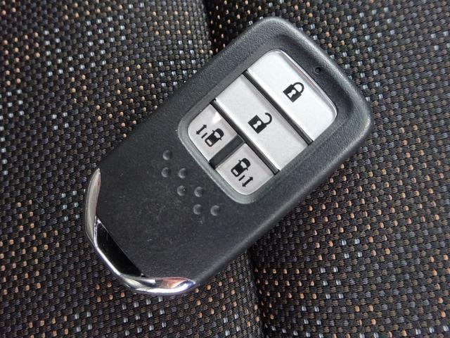 フリード＋ハイブリッド ハイブリッド・クロスターホンダセンシング　４ＷＤ　ホンダセンシング　ルーフボックス　純正９インチナビ　フルセグＴＶ　両側パワースライドドア　バックカメラ　ドライブレコーダー　ＥＴＣ　Ｂｌｕｅｔｏｏｔｈ　ＤＩＳＣ　ＵＳＢ（50枚目）