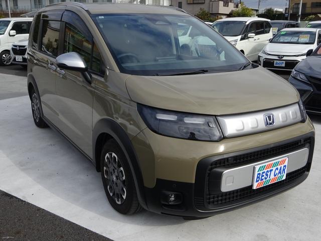 フリード ｅ：ＨＥＶクロスター　ホンダセンシング　純正１１．４インチナビ　フルセグＴＶ　両側パワースライドドア　バックカメラ　ドライブレコーダー　ＥＴＣ　Ｂｌｕｅｔｏｏｔｈ　ＵＳＢ　アダプティブクルーズコントロール（7枚目）