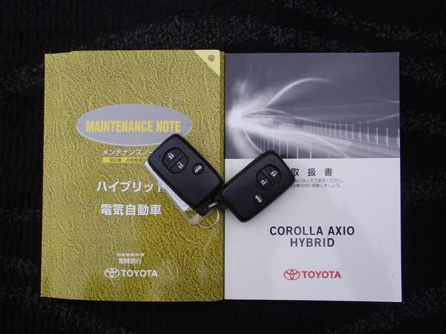 カローラアクシオ ハイブリッドG キーレスキー ETC車載器 ナビTV フルセグTV カーテンエアバッグ 助手席エアバッグ パワーウィンドウ 盗難防止システム バックモニター 定期点検記録簿 ABS 横滑り防止 パワーステアリング(18枚目)