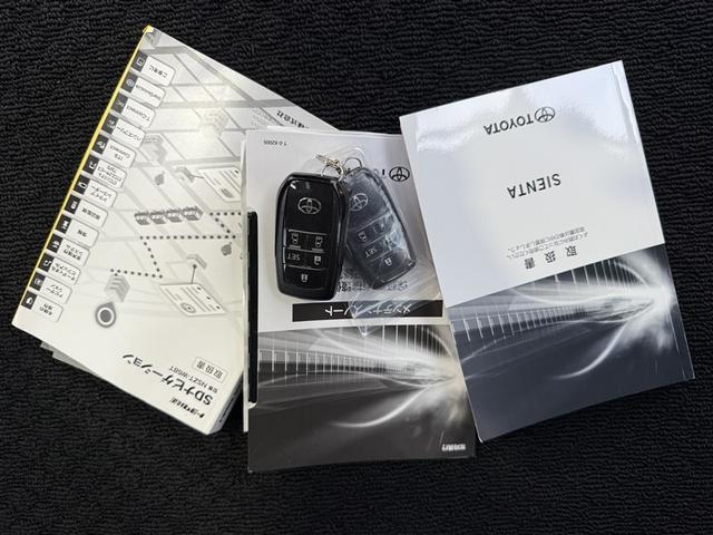 シエンタ G ナビ・TV スマートキープッシュスタート アイドリングS 1オ-ナ- リアカメラ 地デジフルセグ 定期点検記録簿 フルオートエアコン パワーウィンド ETC 運転席エアバック パワステ DVD再生可(25枚目)