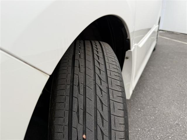 ノア ハイブリッドSi ダブルバイビーII Bカメラ 横滑り防止装置 記録簿有 LED 地デジ 1オーナー オートクルーズ DVD再生可 メモリナビ エアバッグ ETC ナビ&TV 3列シート ABS アルミホイール スマートキ キーレス(27枚目)