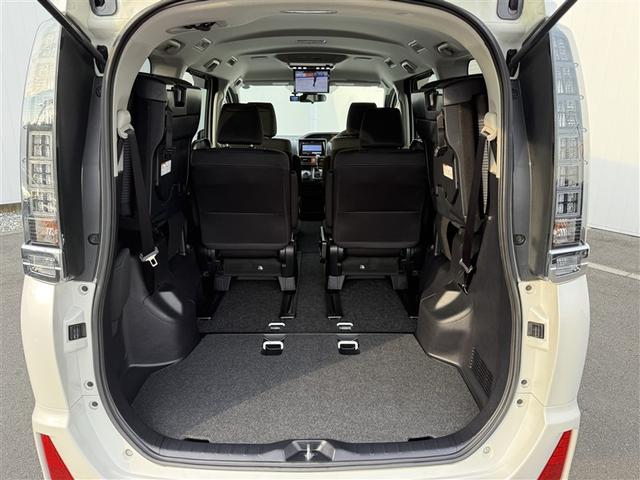 ヴォクシー ＺＳ　煌　地上デジタル　ＴＳＳ　両側パワードア　パワーウィンド　横滑防止　１オーナ　整備記録簿　盗難防止装置　スマートエントリー　Ｂカメラ　ＬＥＤヘッドライト　メモリーナビ　３列シート　ＥＴＣ　ナビ＆ＴＶ　ＡＷ（25枚目）