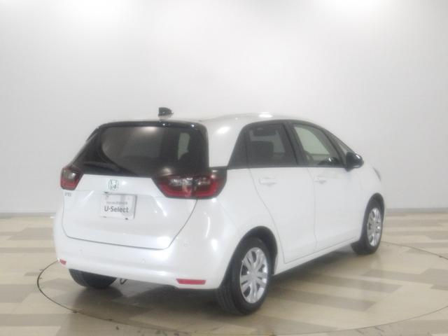 フィット ホーム　元試乗車　禁煙　ドラレコ　大型９インチナビ　ホンダセンシング　渋滞追従　トラフィックジャム　パーキングセンサー　Ｂｌｕｅｔｏｏｔｈ　リアカメラ　コンビシート　オートリトラミラー　サイドエアバッグ　ＢＴ（10枚目）