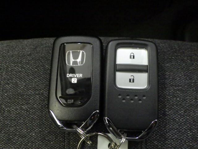 フィット e:HEVホーム 元試乗車 禁煙 9インチナビ 渋滞追従 ホンダセンシング コンビシート パーキングセンサー Bluetooth リアカメラ ETC トラフィックジャムアシスト LEDライト USB サイドエアバッグ(31枚目)