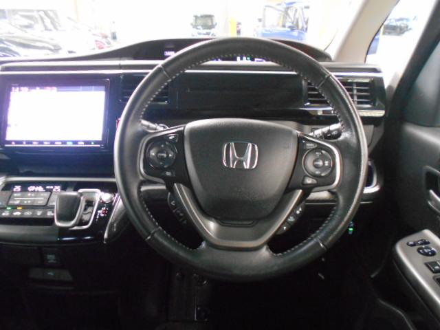 ステップワゴンスパーダ ｅ：ＨＥＶスパーダＧホンダセンシング　禁煙１オーナー　リア席モニター　大型９インチナビ　両電動スライドドア　前後ドラレコ　渋滞追従　ＡｐｐｌｅＣａｒＰｌａｙ　ドアバイザー　リア席サンシェード　シートバックテーブル　ＥＴＣ２．０　ＬＥＤ（20枚目）
