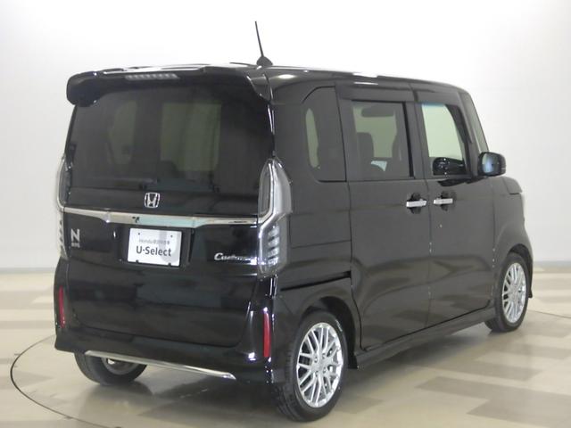 N-BOXカスタム Lターボ 禁煙車 純正ナビ リアカメラdeあんしん+3 両電動スライドドア パドルシフト USB ドアバイザー アルミホイール 後席サンシェード シートバックテーブル フォグライト 渋滞追従 パーキングセンサー(10枚目)