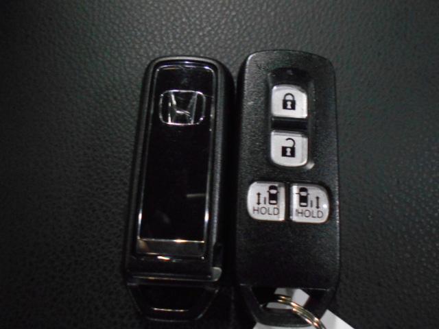 N-BOXカスタム Lターボ 禁煙車 純正ナビ リアカメラdeあんしん+3 両電動スライドドア パドルシフト USB ドアバイザー アルミホイール 後席サンシェード シートバックテーブル フォグライト 渋滞追従 パーキングセンサー(43枚目)