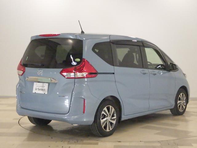 フリードハイブリッド ハイブリッド・Ｇホンダセンシング　禁煙１オーナー　Ｓパッケージ　Ｃパッケージ　前後ドラレコ　純正インターナビ　両電動スライドドア　リアカメラ　コンビシート　センターテーブル　サイドエアバッグ　ドアバイザー　リア席サンシェード　ＥＴＣ（11枚目）