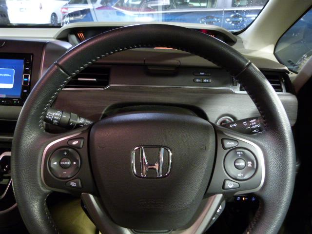 フリードハイブリッド ハイブリッド・Ｇホンダセンシング　禁煙１オーナー　Ｓパッケージ　Ｃパッケージ　前後ドラレコ　純正インターナビ　両電動スライドドア　リアカメラ　コンビシート　センターテーブル　サイドエアバッグ　ドアバイザー　リア席サンシェード　ＥＴＣ（16枚目）