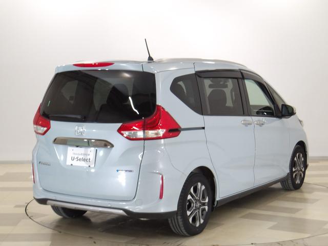 フリードハイブリッド ハイブリッド・クロスター　内外装現状そのまんま車　リア席モニター　大型ナビ　ホンダセンシング　コンビシート　ＡｐｐｌｅＣａｒＰｌａｙ　シートバックテーブル　リアカメラ　両電動スライドドア　ルーフレール　コンフォートビュー　禁煙（13枚目）