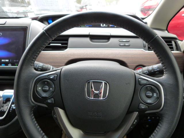 フリードハイブリッド ハイブリッド・クロスター　内外装現状そのまんま車　リア席モニター　大型ナビ　ホンダセンシング　コンビシート　ＡｐｐｌｅＣａｒＰｌａｙ　シートバックテーブル　リアカメラ　両電動スライドドア　ルーフレール　コンフォートビュー　禁煙（25枚目）