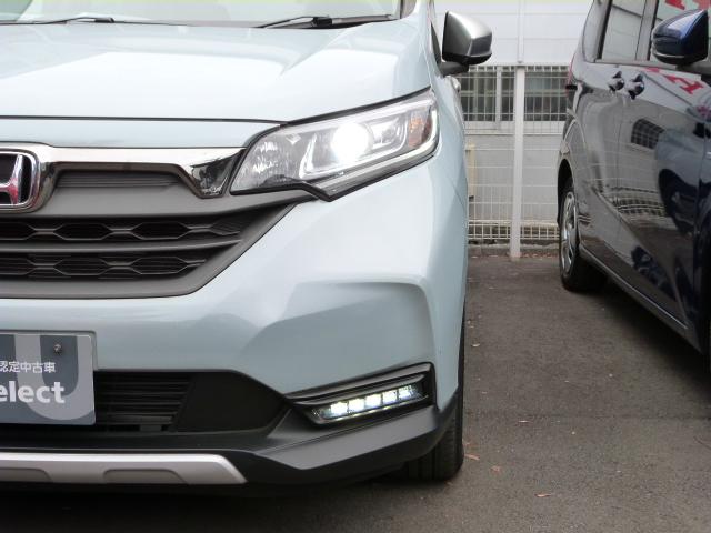 フリードハイブリッド ハイブリッド・クロスター　内外装現状そのまんま車　リア席モニター　大型ナビ　ホンダセンシング　コンビシート　ＡｐｐｌｅＣａｒＰｌａｙ　シートバックテーブル　リアカメラ　両電動スライドドア　ルーフレール　コンフォートビュー　禁煙（32枚目）