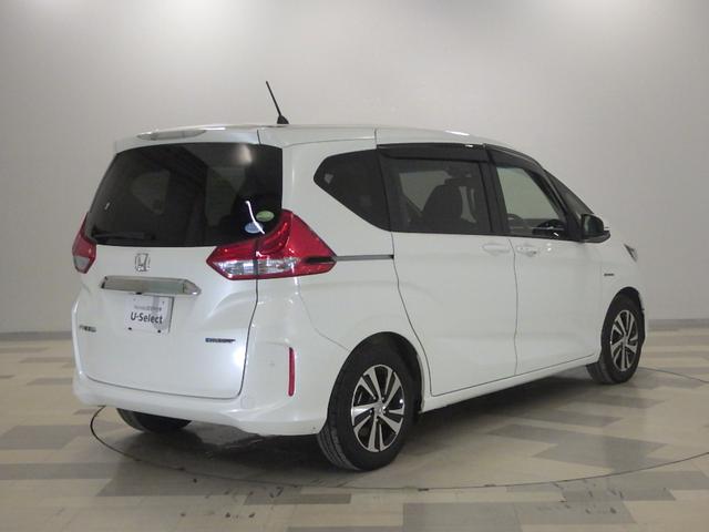 フリードハイブリッド ハイブリッド・ＥＸ　禁煙１オーナー　前後センサー　Ｃパッケージ　Ｓパッケージ　純正ナビ　リアカメラ　両電動スライドドア　コンビシート　シートヒーター　コンフォートビューパッケージ　ドアバイザー　２列目ＵＳＢチャージャー（9枚目）