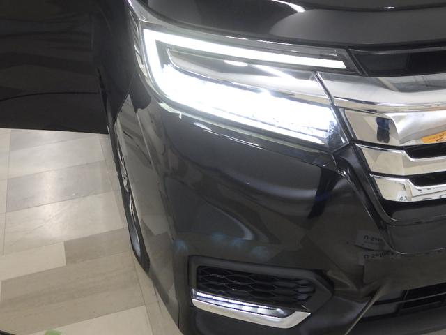 ステップワゴンスパーダ スパーダホンダセンシング　禁煙車　リア席モニター　大型１０インチナビ　ＡｐｐｌｅＣａｒＰｌａｙ　前後ドラレコ　両電動スライドドア　パドルシフト　ラゲッジオーガナイザーＢＯＸ　ドアバイザー　リア席サンシェード　ＥＴＣ２．０（24枚目）