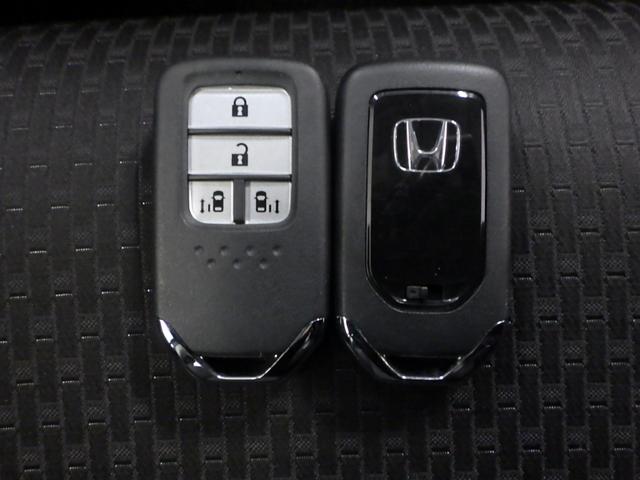 ステップワゴンスパーダ スパーダホンダセンシング　禁煙車　リア席モニター　大型１０インチナビ　ＡｐｐｌｅＣａｒＰｌａｙ　前後ドラレコ　両電動スライドドア　パドルシフト　ラゲッジオーガナイザーＢＯＸ　ドアバイザー　リア席サンシェード　ＥＴＣ２．０（40枚目）