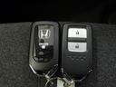 e:HEVホーム 元試乗車 禁煙 9インチナビ 渋滞追従 ホンダセンシング コンビシート パーキングセンサー Bluetooth リアカメラ ETC トラフィックジャムアシスト LEDライト USB サイドエアバッグ(31枚目)