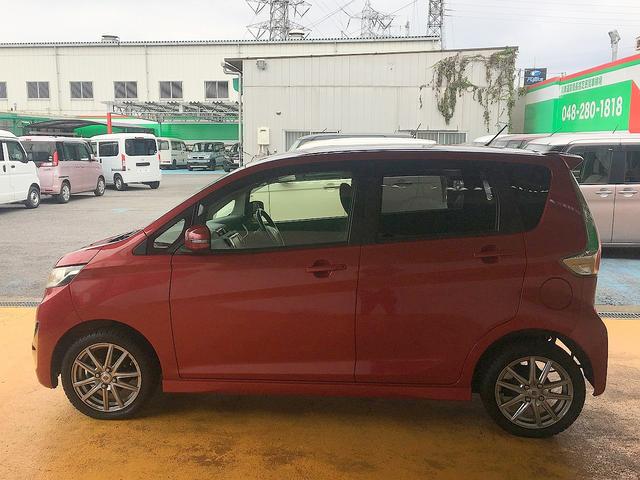 ｅＫカスタム Ｔ　修復歴なし　１オーナ　禁煙車　純正ＳＤナビ　ＣＤ／ＡＵＸ／ＵＳＢ再生　フルセグＴＶ　バックカメラ　ＥＴＣ　スマートキー　オートエアコン　ＨＩＤ　フォグ　純正フルエアロ＆社外１５ＡＷ（9枚目）