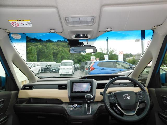 フリード Ｇ・ホンダセンシング　Ｗ電動　純ナビ　後カメラ　純ドラレコ前　禁煙　１オーナー　ハロゲンライト　ＥＴＣ　盗難防止　ロールサンシェード　２列目キャプテンシート　６人乗　フルセグＴＶ　Ｂｌｕｅｔｏｏｔｈ　ＣＤ録音　整備記録簿（2枚目）