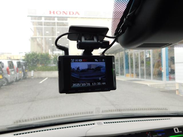 フリードハイブリッド ハイブリッド・Ｇホンダセンシング　純９型ナビ　ドラレコ前後　後カメ　Ｗ電動　禁煙　フロントセンサー　ＬＥＤ　ＥＴＣ　盗難防止　革巻　純１５アルミホイール　Ｂｌｕｅｔｏｏｔｈ　フルセグＴＶ　ＣＤ録音　ＵＳＢ　シートヒーター　ドアバイザー（4枚目）