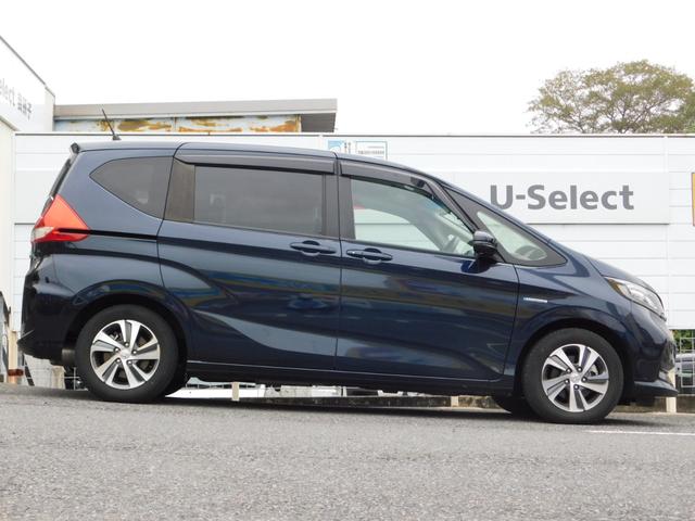 フリードハイブリッド ハイブリッド・Ｇホンダセンシング　純９型ナビ　ドラレコ前後　後カメ　Ｗ電動　禁煙　フロントセンサー　ＬＥＤ　ＥＴＣ　盗難防止　革巻　純１５アルミホイール　Ｂｌｕｅｔｏｏｔｈ　フルセグＴＶ　ＣＤ録音　ＵＳＢ　シートヒーター　ドアバイザー（10枚目）