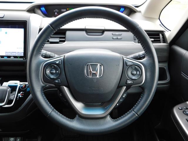 フリードハイブリッド ハイブリッド・Ｇホンダセンシング　純９型ナビ　ドラレコ前後　後カメ　Ｗ電動　禁煙　フロントセンサー　ＬＥＤ　ＥＴＣ　盗難防止　革巻　純１５アルミホイール　Ｂｌｕｅｔｏｏｔｈ　フルセグＴＶ　ＣＤ録音　ＵＳＢ　シートヒーター　ドアバイザー（14枚目）