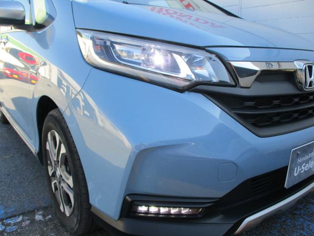 フリード＋ハイブリッド ハイブリッド・クロスターホンダセンシング　禁煙　純正ナビ　フルセグＴＶ　ＢＴ　バックカメラ　ＥＴＣ　両側電動スライドドア　ナビ連動純正前後ドラレコ　ＬＥＤ　ＬＥＤフォグライト　純正１５インチアルミホイール　ドアバイザー　地デジフルセグ　ＵＳＢ（7枚目）