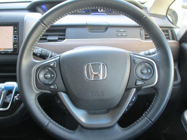 フリード＋ハイブリッド ハイブリッド・クロスターホンダセンシング　禁煙　純正ナビ　フルセグＴＶ　ＢＴ　バックカメラ　ＥＴＣ　両側電動スライドドア　ナビ連動純正前後ドラレコ　ＬＥＤ　ＬＥＤフォグライト　純正１５インチアルミホイール　ドアバイザー　地デジフルセグ　ＵＳＢ（12枚目）