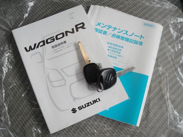 ワゴンＲ ＦＸ　禁煙車　アイドリングストップ　オートエアコン　リモコンキー　ＥＴＣ　アームレスト　ドアバイザー　プライバシーガラス　電動格納ミラー　社外１４インチアルミホイール　記録簿　フィズブルーパールメタリック（25枚目）