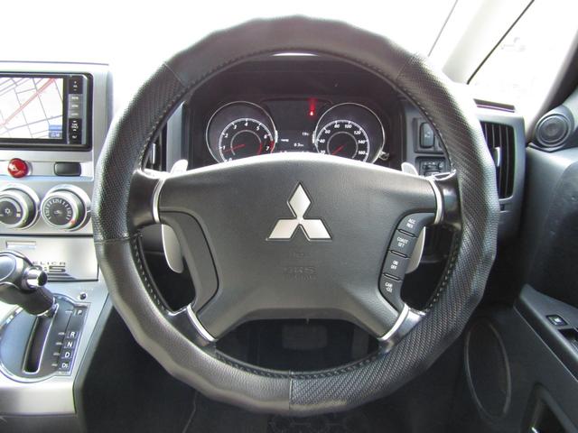 デリカＤ：５ Ｇ　パワーパッケージ　リフトＵＰカスタム　ストラーダ７型メモリナビ　ＣＤ／ＤＶＤ再生　ＢＴオーディオ　地デジ　電動スライドドア　バックカメラ　フロントチューブガード　社外１６インチＡＷ＋デューラー　ＥＴＣ（31枚目）