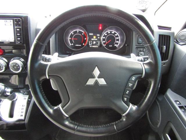 デリカＤ：５ Ｄ　パワーパッケージ　リフトＵＰカスタム　７人乗り　ストラーダ７型メモリナビ　ＢＴオーディオ　地デジ　両パワスラ　フリップダウンモニター　ＧｉギアＦプルバー　サイドステップ　ソリッドレーシング＋ジオランダー　ＥＴＣ（32枚目）