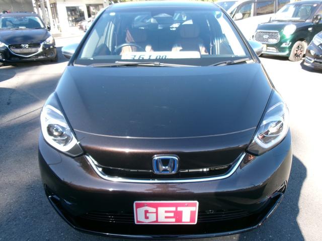 フィット ｅ：ＨＥＶリュクス　禁煙車　純正ナビ　バックカメラ　Ｂｌｕｅｔｏｏｔｈ　ＤＶＤ再生　ＵＳＢ　純正前後ドラレコ　ステコン　ＥＴＣ　ワイヤレススマホ充電　ホンダセンシング　レザーシート　シートヒーター　スマートキー（6枚目）