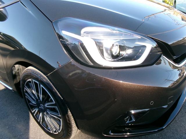 フィット ｅ：ＨＥＶリュクス　禁煙車　純正ナビ　バックカメラ　Ｂｌｕｅｔｏｏｔｈ　ＤＶＤ再生　ＵＳＢ　純正前後ドラレコ　ステコン　ＥＴＣ　ワイヤレススマホ充電　ホンダセンシング　レザーシート　シートヒーター　スマートキー（24枚目）