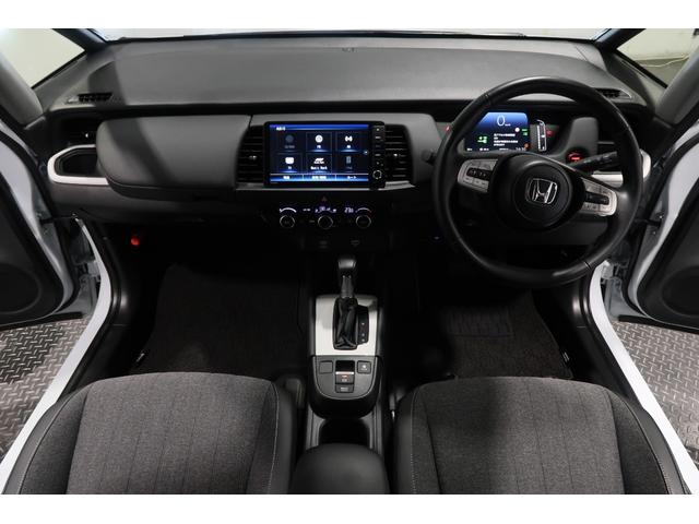 フィット e:HEVホーム 認定中古車 2年保証付 ナビ Bカメラ ETC 運転支援 デモカー 前後誤発進抑制機能 クリソナ 助手席エアバッグ 運転席エアバッグ 半革シート ACC 車線維持支援システム 電格ミラー AUX(8枚目)