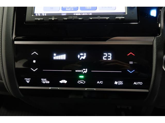 フィットハイブリッド Fパッケージ ホンダ認定中古車 1年保証 メモリーナビ Bカメラ ドラレコ ETC 盗難警報装置 ワンオ-ナ-車 AUTOエアコン カーテンエアバック 助手席エアバック ECON リヤカメラ ABS付 DVD視聴(12枚目)