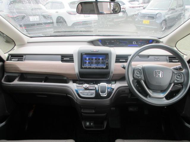 フリードハイブリッド ハイブリッド・Gホンダセンシング 1年保証付 両側パワースライドドア 前後ドライブレコーダー メモリーナビ 地デジフルセグ Bluetooth バックカメラ ETC シートヒーター 車両追従クルージング装置 軽減ブレーキ 1オ-ナ-(12枚目)