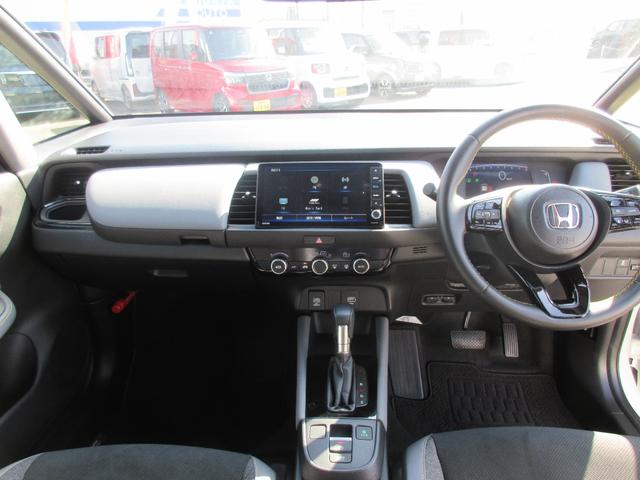 フィット ＲＳ　ホンダ認定中古車２年保証付　ドライブレコーダー　メモリーナビ　地デジフルセグ　Ｂｌｕｅｔｏｏｔｈ　バックカメラ　ＥＴＣ車載器　安全補助装置　障害物センサー　ハーフレザーシート　スマートキー　リアカメラ（7枚目）