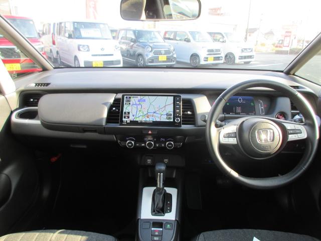 フィット ｅ：ＨＥＶホーム　ホンダ認定中古車２年保証付　メモリーナビ　地デジフルセグ　ＵＳＢ端子ＢｌｕｅｔｏｏｔｈＵ　障害物センサー　バックカメラ　ＥＴＣ車載器　安全補助装置　車両追従クルージング　スマートキー　クリソナ　ＡＣＣ（8枚目）