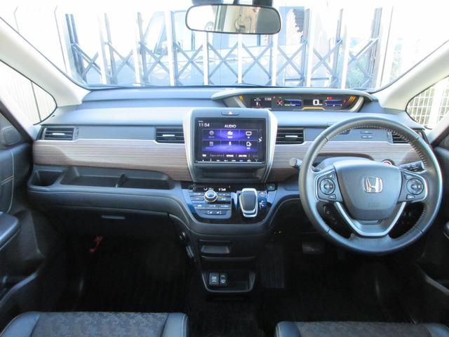 フリードハイブリッド ハイブリッド・クロスター　ホンダ認定中古車２年保証付　前後ドライブレコーダー　両側パワースライドドア　１００Ｖ電源　シートヒーター　メモリーナビ　Ｂｌｕｅｔｏｏｔｈ　バックカメラ　ＥＴＣ　安全補助装置　車両追従クルージング（8枚目）