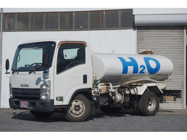 エルフトラック 散水車 4000L 前圧力後重力散水 走行2.6万キロ 6速MT 極東製LH04-302R 車両総重量7.295キロ 準中型免許(2枚目)