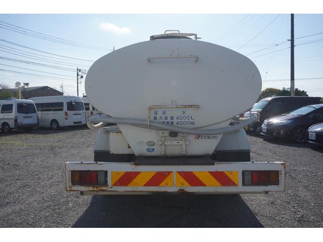 エルフトラック 散水車 4000L 前圧力後重力散水 走行2.6万キロ 6速MT 極東製LH04-302R 車両総重量7.295キロ 準中型免許(10枚目)