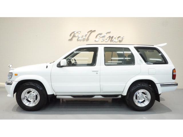 テラノ ワイド　Ｒ３ｍ－Ｒ　エアロＩＩ　カロッツェナビ　フルセグ　バックカメラ　ＨＩＤ　サイドステップ　Ｒスポ　ウッド調パネル　サイドステップ　背面タイヤ（11枚目）