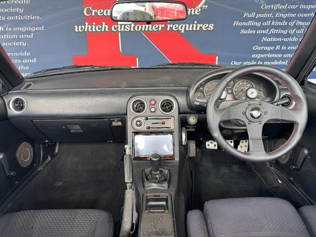 ユーノスロードスター Ｓスペシャル　ＭＡＺＤＡＳＰＥＥＤマフラー　ＨＫＳエアクリ　ＫＴＳ車高調　Ｐｅｒｓｏｎａｌステアリング　ラフィックスクイックリリース　社外エキマニ　純正１４ｉｎＡＷ　ＫＥＮＷＯＯＤナビ（4枚目）