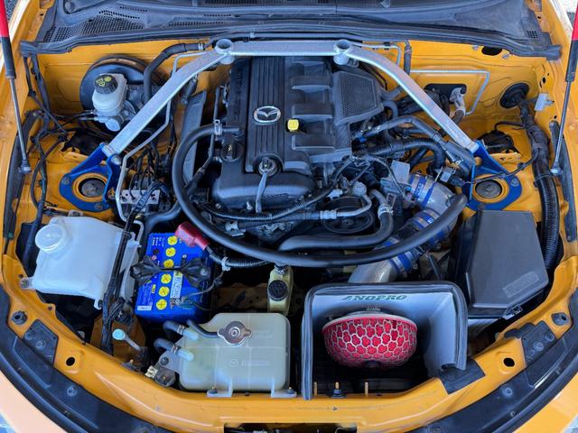 ロードスター ＲＳ　ＡｕｔｏＥｘｅフロントバンパー　ＴＲＵＳＴエキマニ／キャタライザー　ビルシュタイン車高調　社外マフラー　ＨＫＳエアクリ　ＣＵＳＣＯタワーバー　純正１６ｉｎＡＷ　ＭＯＭＯステ　カロッツェリアナビ　ＥＴＣ（3枚目）