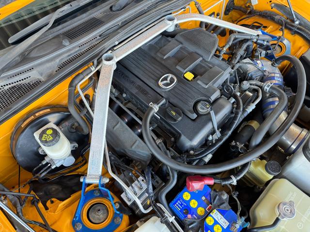 ロードスター ＲＳ　ＡｕｔｏＥｘｅフロントバンパー　ＴＲＵＳＴエキマニ／キャタライザー　ビルシュタイン車高調　社外マフラー　ＨＫＳエアクリ　ＣＵＳＣＯタワーバー　純正１６ｉｎＡＷ　ＭＯＭＯステ　カロッツェリアナビ　ＥＴＣ（21枚目）