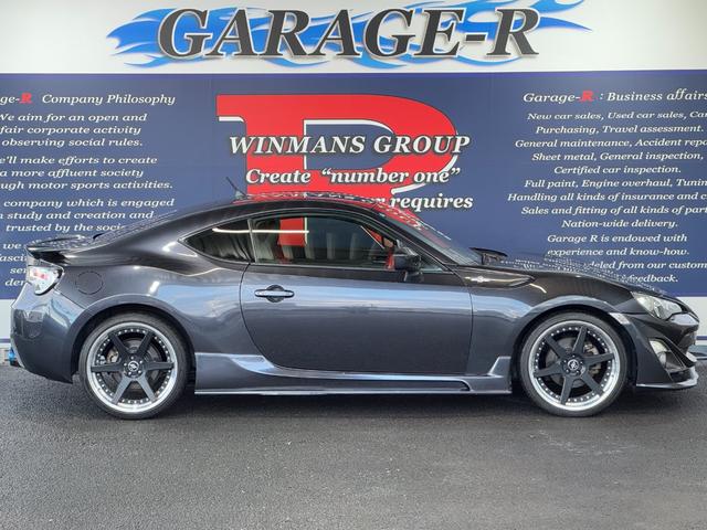 ８６ ＧＴリミテッド　ＴＯＭ’Ｓ　フロントバンパー　社外サイドステップ　ＧＲｅｄｄｙマフラー　ＷＯＲＫ　ＺＥＡＳＴ１９ｉｎＡＷ　Ｖａｌｅｎｔｉテールランプ　トランクスポイラー　ＢＬＩＴＺシフトノブ　純正ナビ（6枚目）